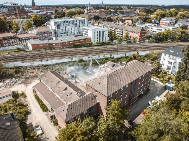 Luftaufnahme einer weitgehend geräumten Rückbaufläche